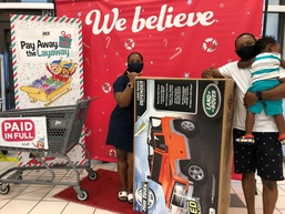 NEX Customers Receive Holiday Surprise, Have Layaways Paid Off