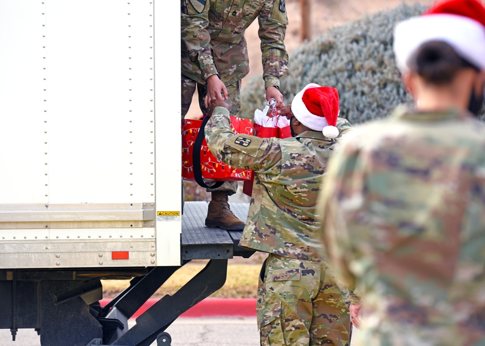 Fort Bliss Soldiers organize toy drive for local children’s home, establish Santa Claus call center