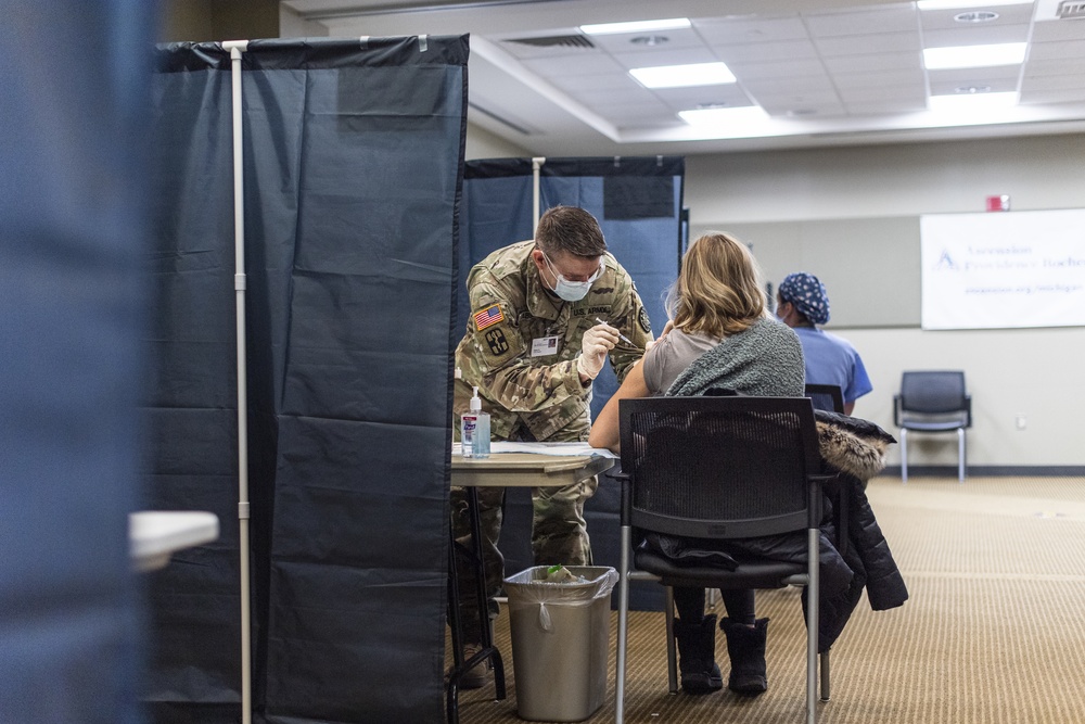 Michigan National Guard, Administers the COVID-19 Vaccine