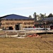 Last of 6 new simulations buildings under construction at Fort McCoy