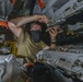 Aviation Ordnanceman Prepares Bomb Rack Aboard USS Nimitz CVN 68