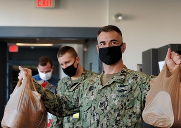 Sailors Caring and Sharing help make Holidays a Little Easier and Happier for Families