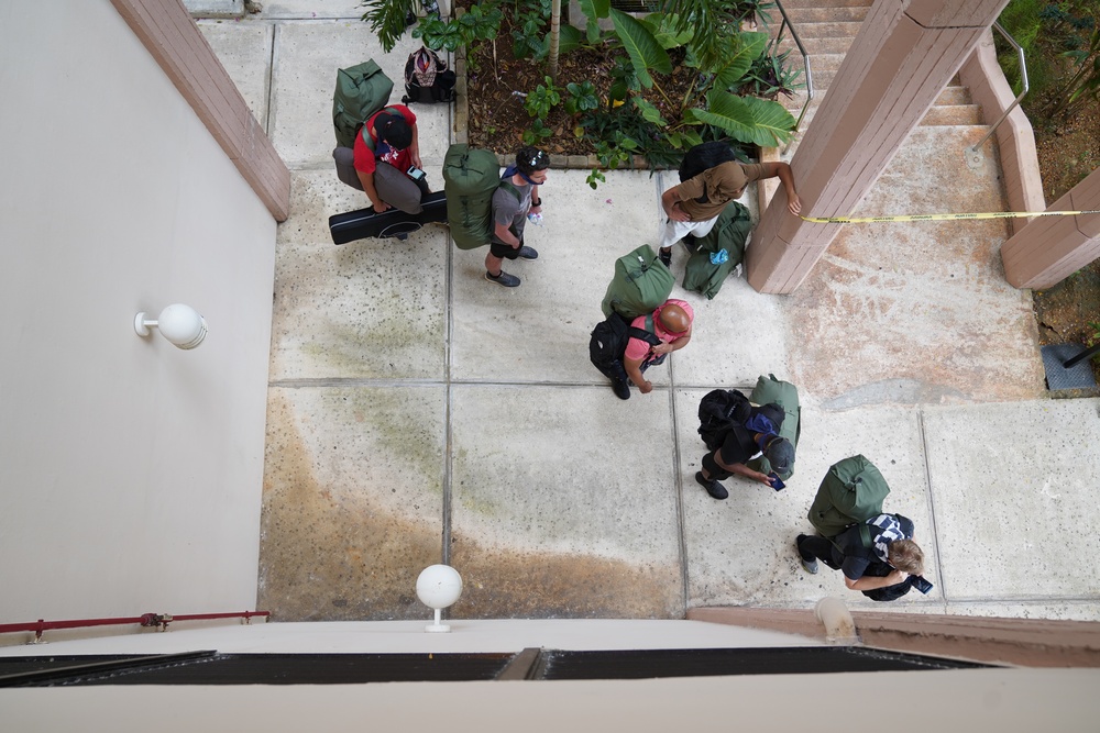 USS Theodore Roosevelt Sailors Check into Commercial Lodging