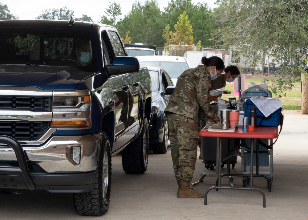 Drive-thru vaccination line keeps 919 SOW Airmen medically ready