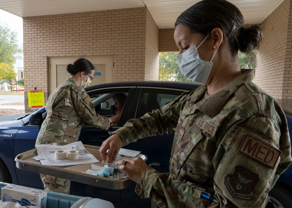 Drive-thru vaccination line keeps 919 SOW Airmen medically ready