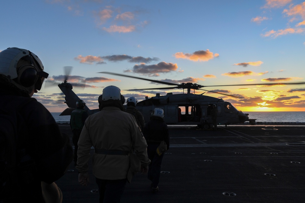 Rear Admiral Boards Helicopter