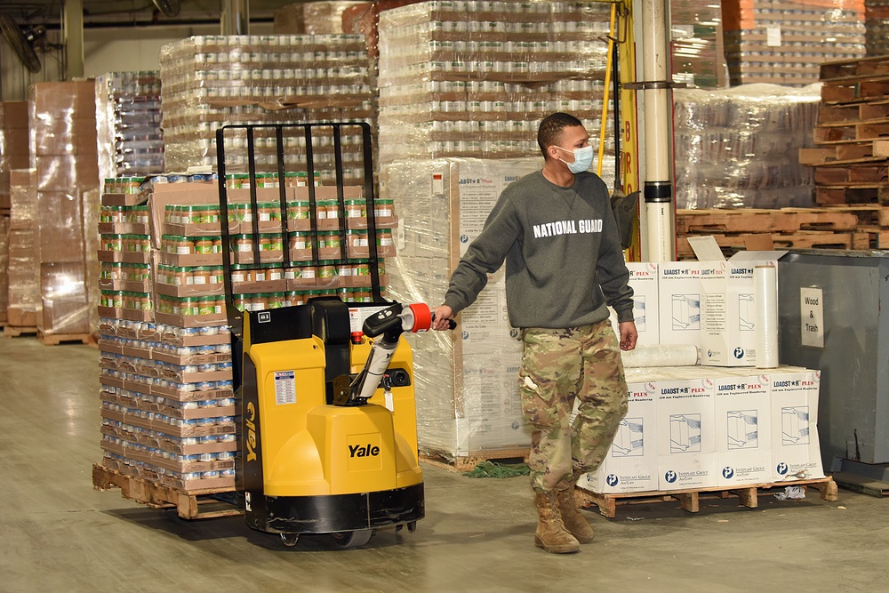 Michigan’s Task Force Spartan work with Gleaners of Detroit