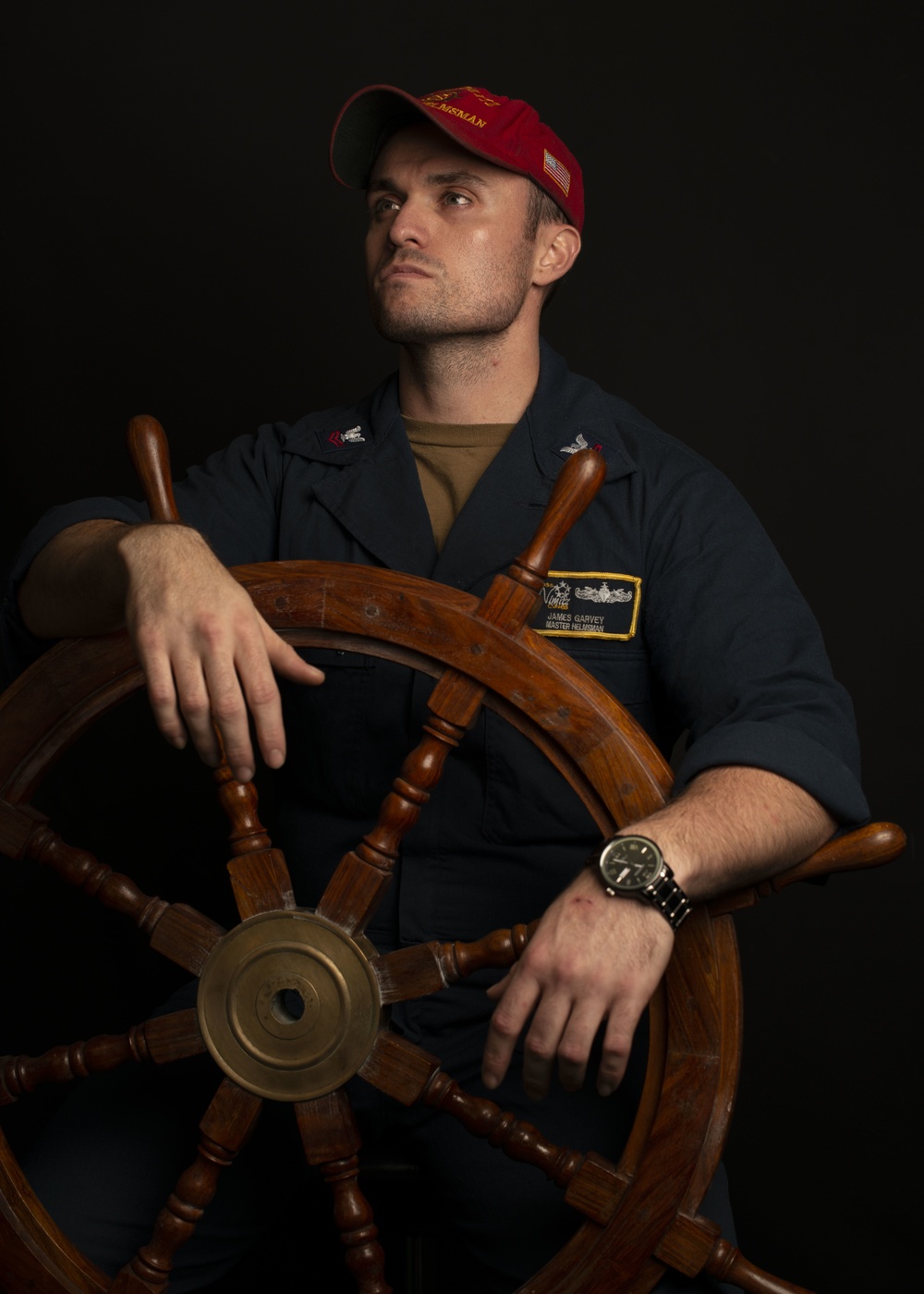 Nimitz Sailor Poses For Master Helmsman Studio Portrait