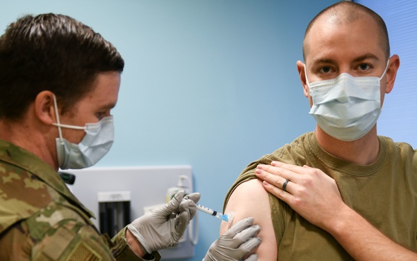 COVID-19 vaccinations begin for U.K. tri-base community