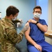 COVID-19 vaccinations begin for U.K. tri-base community