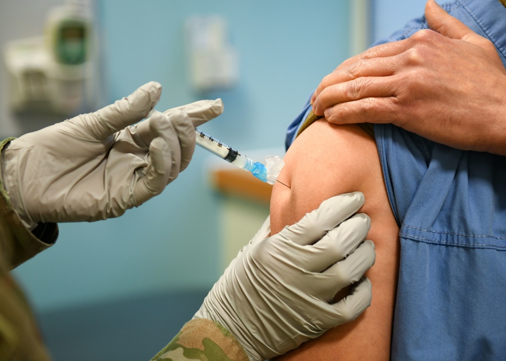 COVID-19 vaccinations begin for U.K. tri-base community