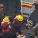 ADR Detachment Marines, USS Somerset Sailors, work together to launch RHIBs for a small boat training operation