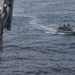 ADR Detachment Marines, USS Somerset Sailors, work together to launch RHIBs for a small boat training operation