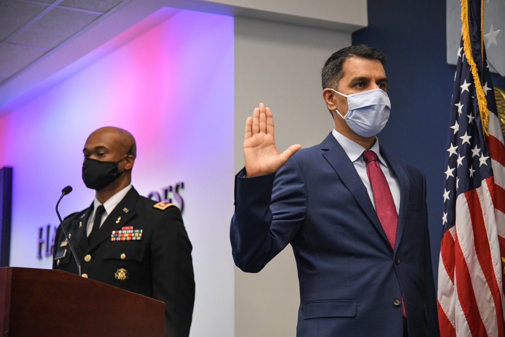 Farhan Khan, Director of Architecture, Data and Standards, Army CIO, recognized during pinning ceremony