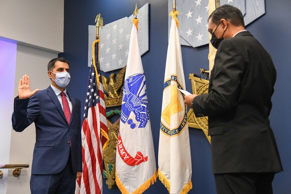 Farhan Khan, Director of Architecture, Data and Standards, Army CIO, recognized during pinning ceremony