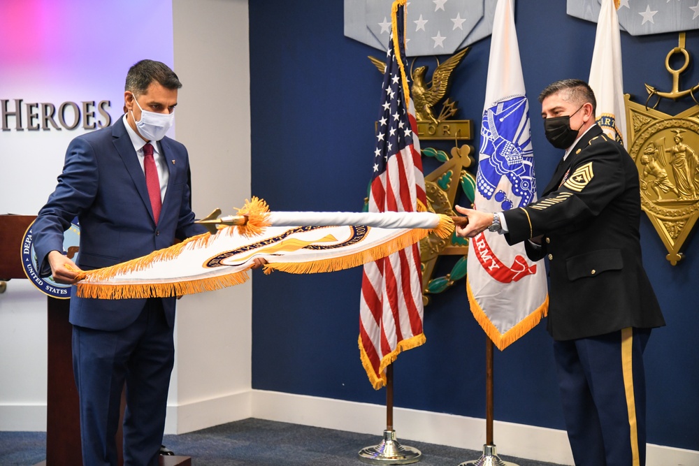 Farhan Khan, Director of Architecture, Data and Standards, Army CIO, recognized during pinning ceremony