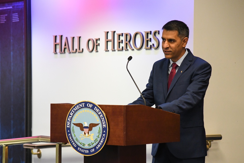 Farhan Khan, Director of Architecture, Data and Standards, Army CIO, recognized during pinning ceremony