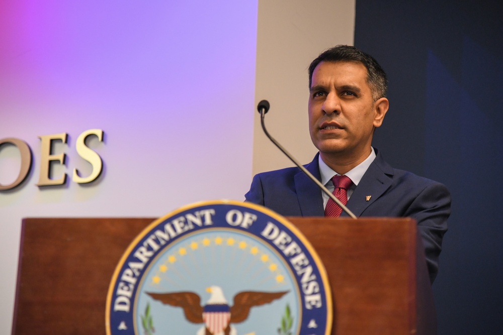 Farhan Khan, Director of Architecture, Data and Standards, Army CIO, recognized during pinning ceremony