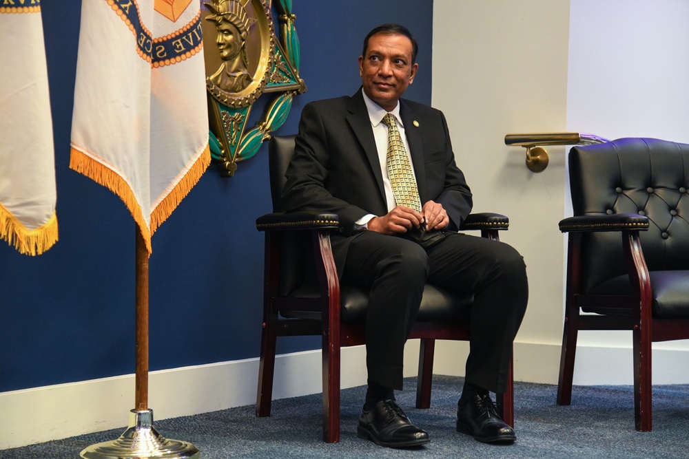 Farhan Khan, Director of Architecture, Data and Standards, Army CIO, recognized during pinning ceremony