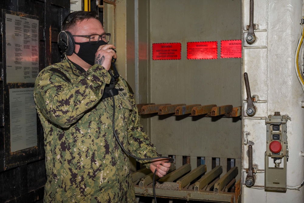 USS George Washington Sailors test the Conveyors