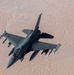 B-52 Stratofortress and F-16 Fighting Falcon fly over U.S. Central Command