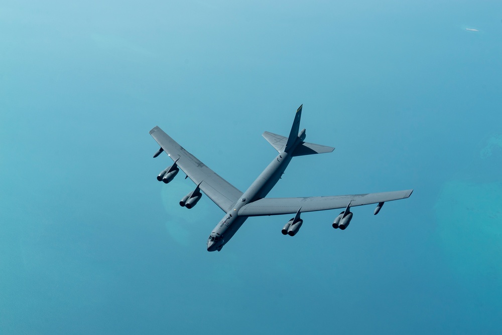 B-52 Stratofortress and F-16 Fighting Falcon fly over U.S. Central Command