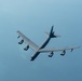 B-52 Stratofortress and F-16 Fighting Falcon fly over U.S. Central Command