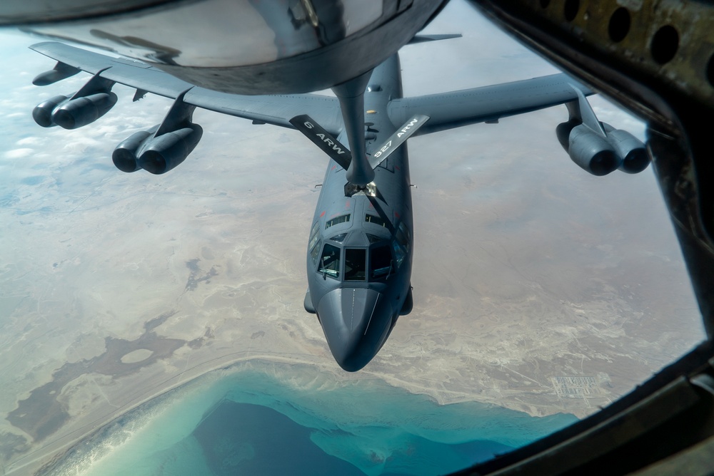 B-52 Stratofortress and F-16 Fighting Falcon fly over U.S. Central Command