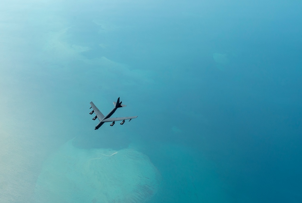 B-52 Stratofortress and F-16 Fighting Falcon fly over U.S. Central Command
