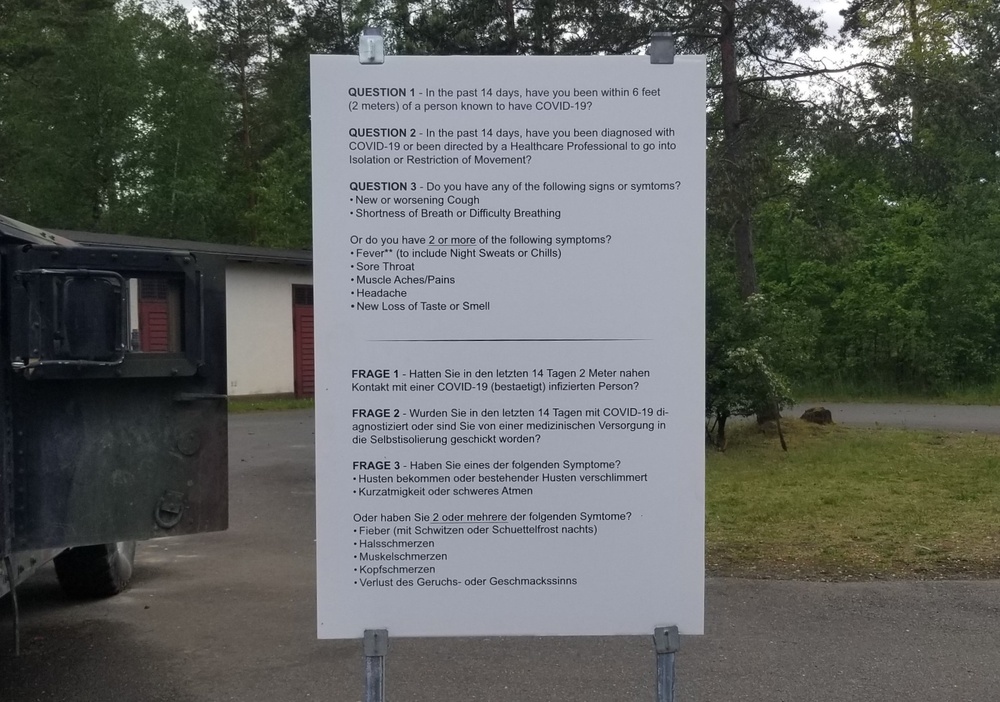 USAG Bavaria COVID-19 health questionnaire sign posted at gate entrances