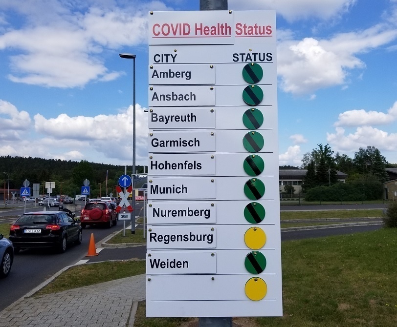 USAG Bavaria COVID-19 health status sign posted at gate exits