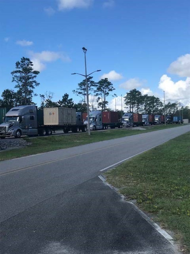 Trucks lined up at Military Ocean Terminal Sunny Point to offload containers.