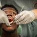 NMCSD OMFS Inspects Patient’s Oral Cavity After Immediate Jaw Replacement Procedure