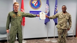 Union Springs Sailor Reenlists in U.S. Navy while in Singapore