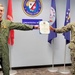 Union Springs Sailor Reenlists in U.S. Navy while in Singapore