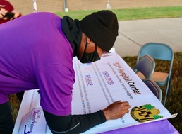 Soldiers, Families walk to raise domestic violence awareness