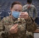 Essential Team Travis medical personnel receive base's first COVID-19 vaccines