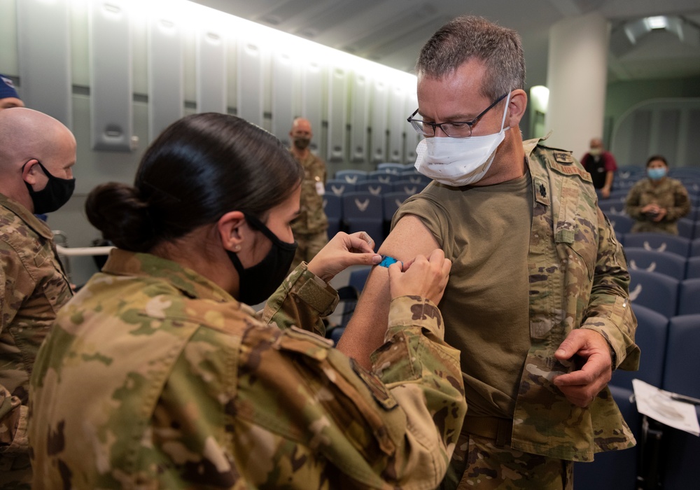 Essential Team Travis medical personnel receive base's first COVID-19 vaccines