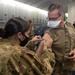 Essential Team Travis medical personnel receive base's first COVID-19 vaccines