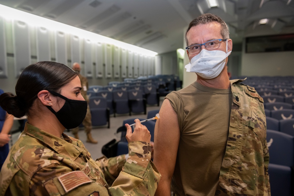 Essential Team Travis medical personnel receive base's first COVID-19 vaccines