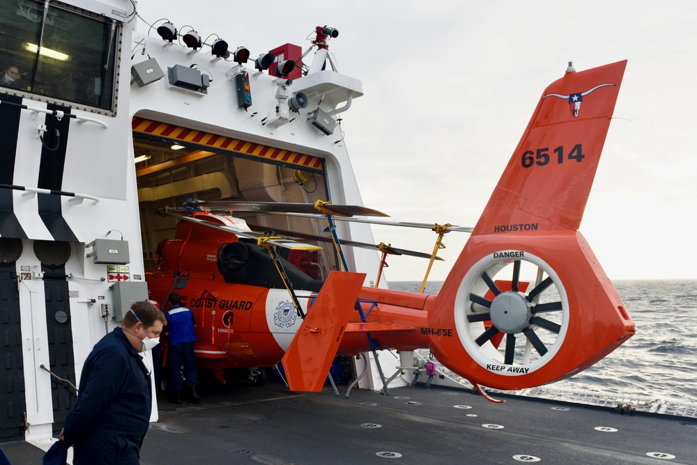 USCGC Stone puts MH-65 Dolphin to bed