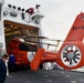 USCGC Stone puts MH-65 Dolphin to bed