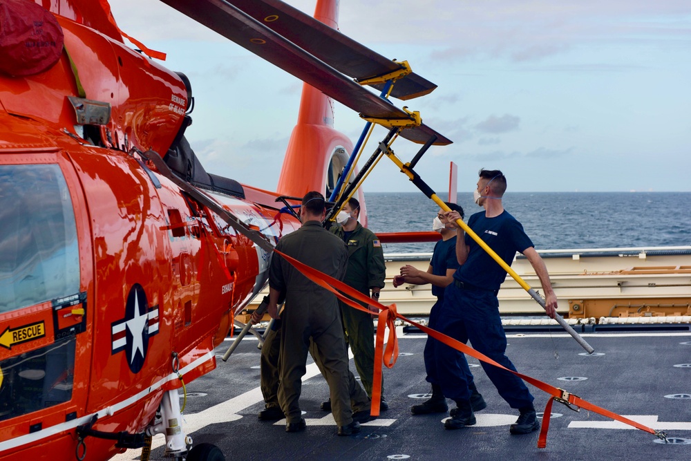 USCGC Stone prepares MH-65 Dolphin for sheltering