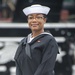 Airman Tasheyana Harden poses for a photo in front of USS Constitution