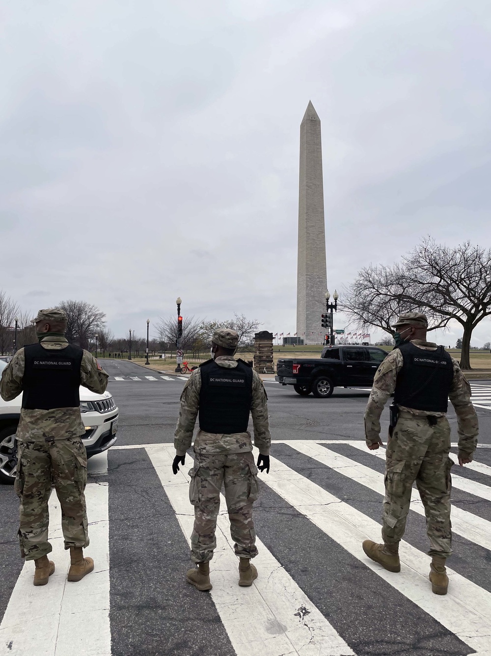 DC National Guard members, stand in front of monument in Washington, D.C on January 5 2021. The District of Columbia National Guard   activated several hundred personnel to support the city government during expected demonstrations.