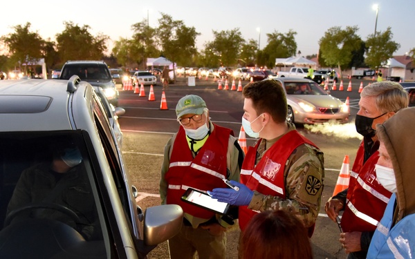 Arizona National Guard partners with retired medical professionals to provide COVID-19 vaccinations