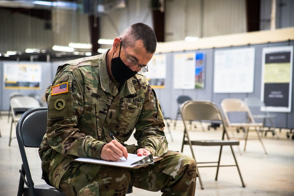 Command Sgt. Maj. Michael Perry Receives the Covid-19 Vaccine