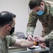 Spartan Medics Distribute Vaccine to Paratroopers
