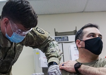 Spartan Medics Distribute Vaccine to Paratroopers