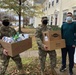 Soldiers within the DCS G6 and CIO delivering meals and gifts to local soldiers in need
